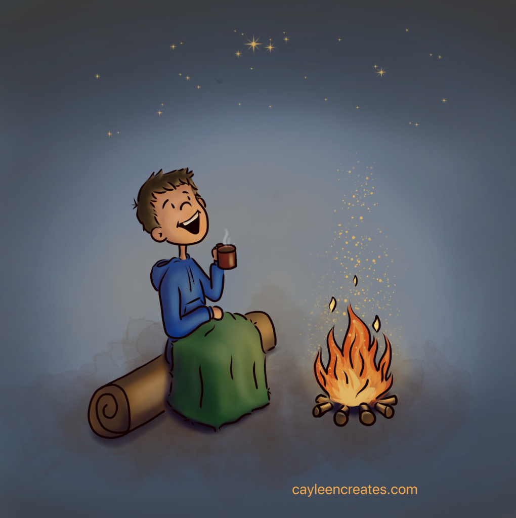boy sitting by campfire looking at stars