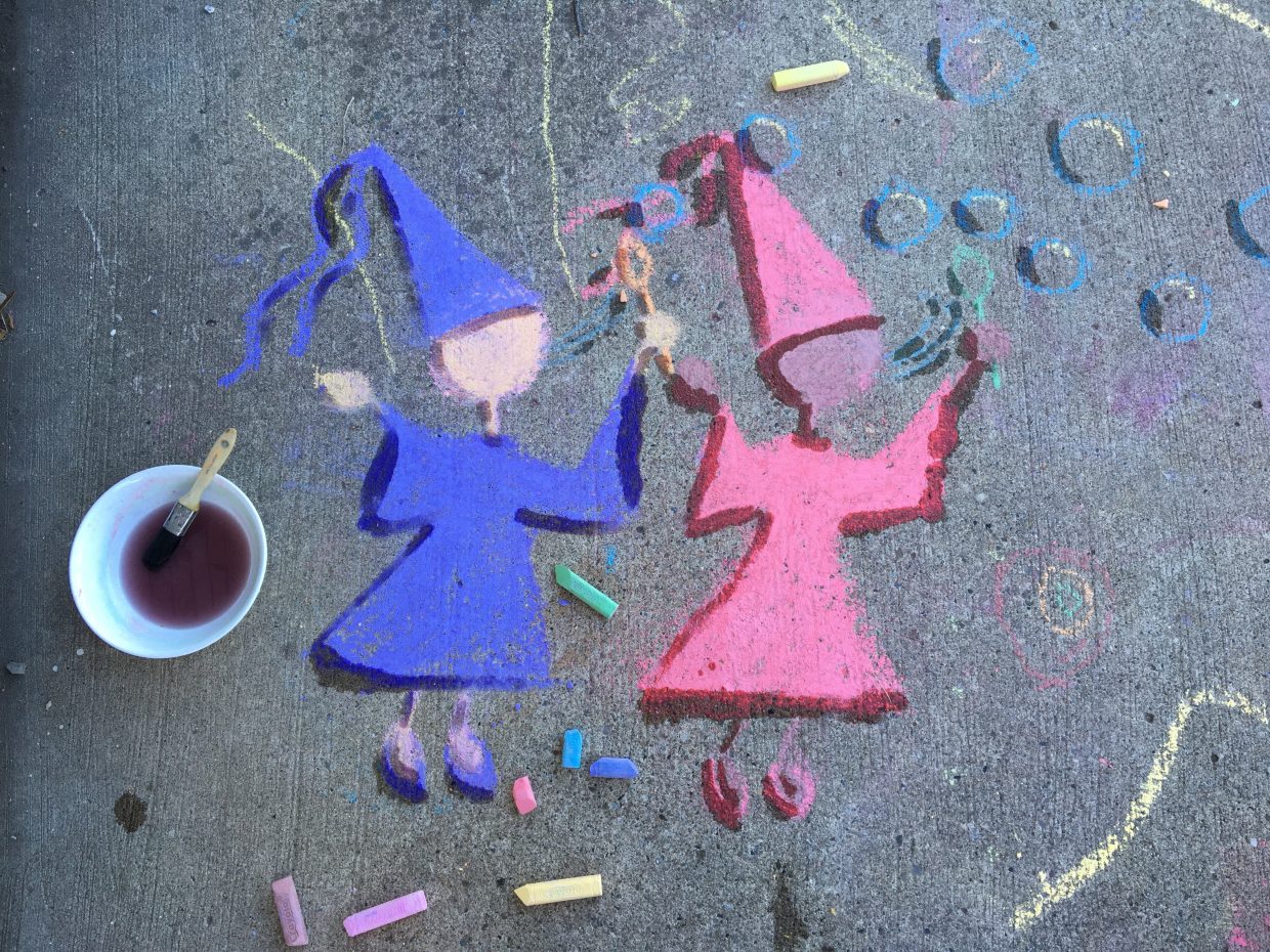 chalk princesses blowing bubble