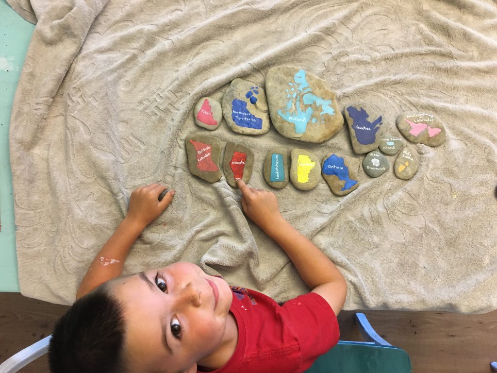 Painted rock map of Canada