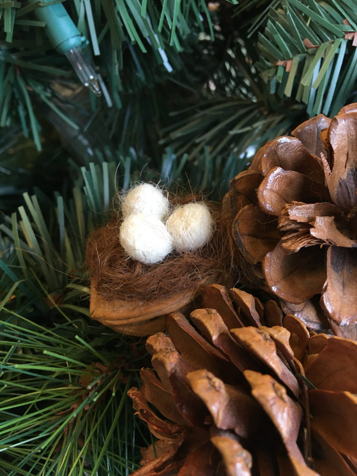 felted nest in a Christmas tree